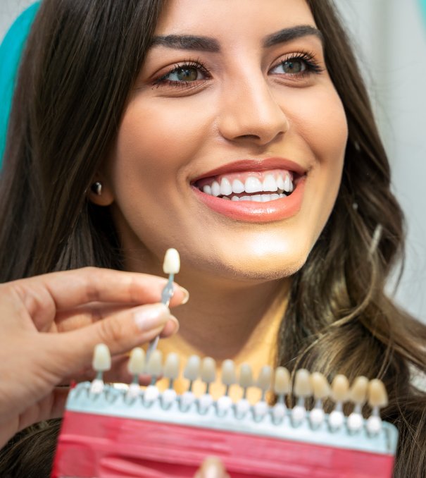 man smiling in dentists chair