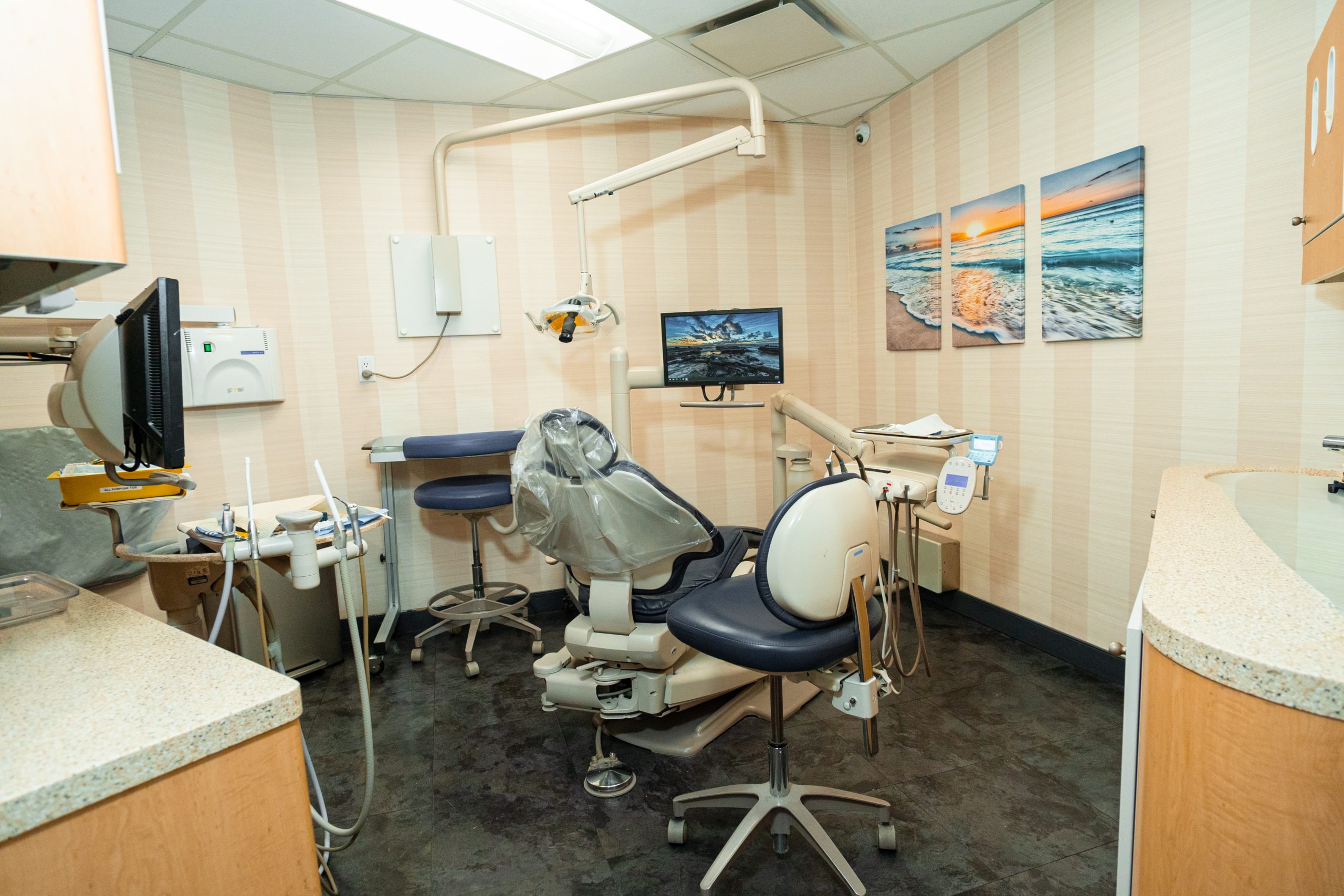 man smiling in dentists chair